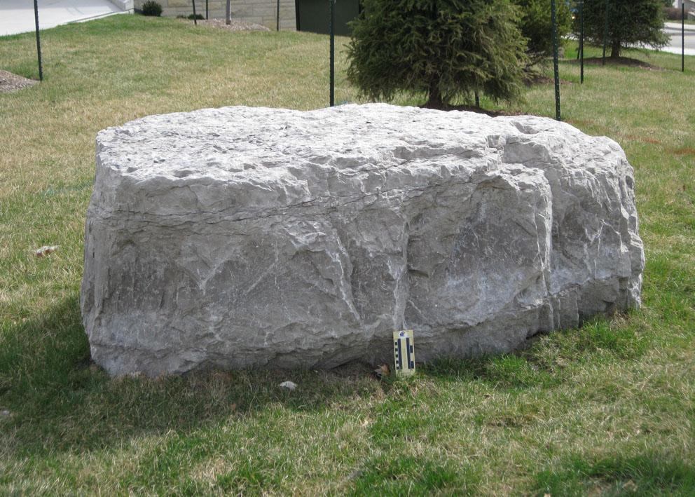 boulder 13 is limestone and is located at the corner of Crescent road and Naismith Drive, north of Ritchie Hall.
