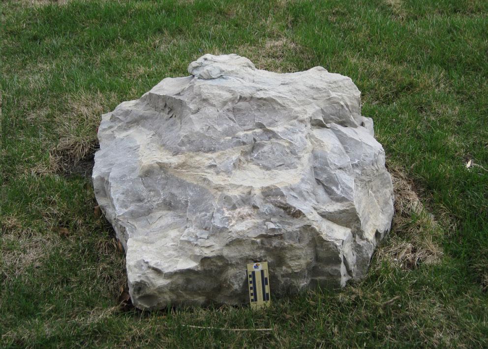 boulder 26 is limestone and is located on the east side of Slawson Hall 