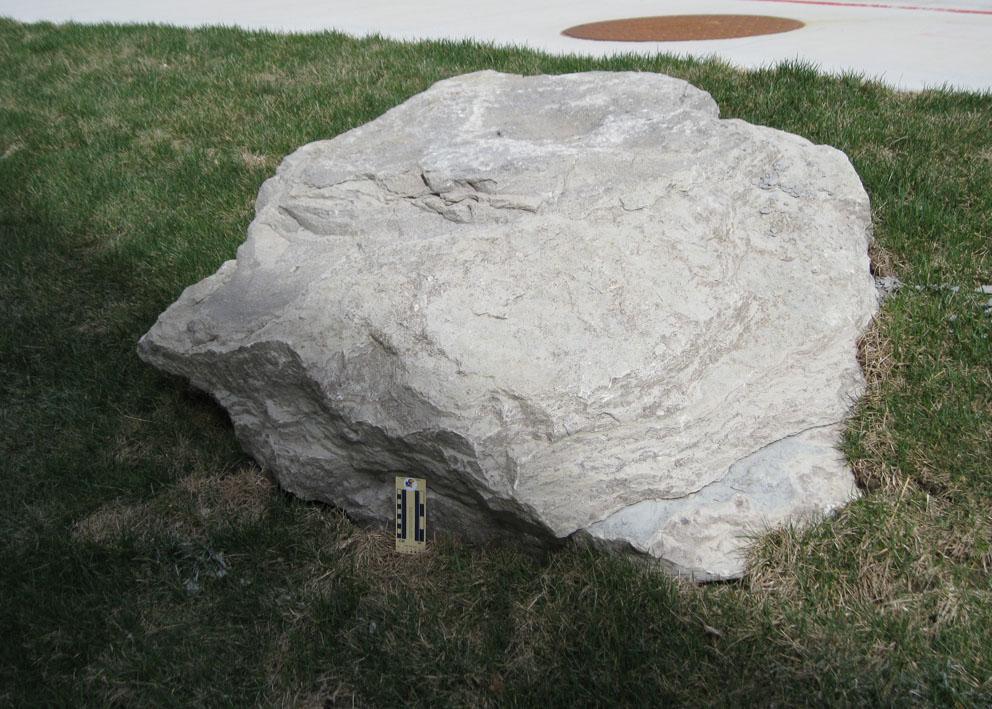 boulder 30 is limestone and is located on the east side of Slawson Hall