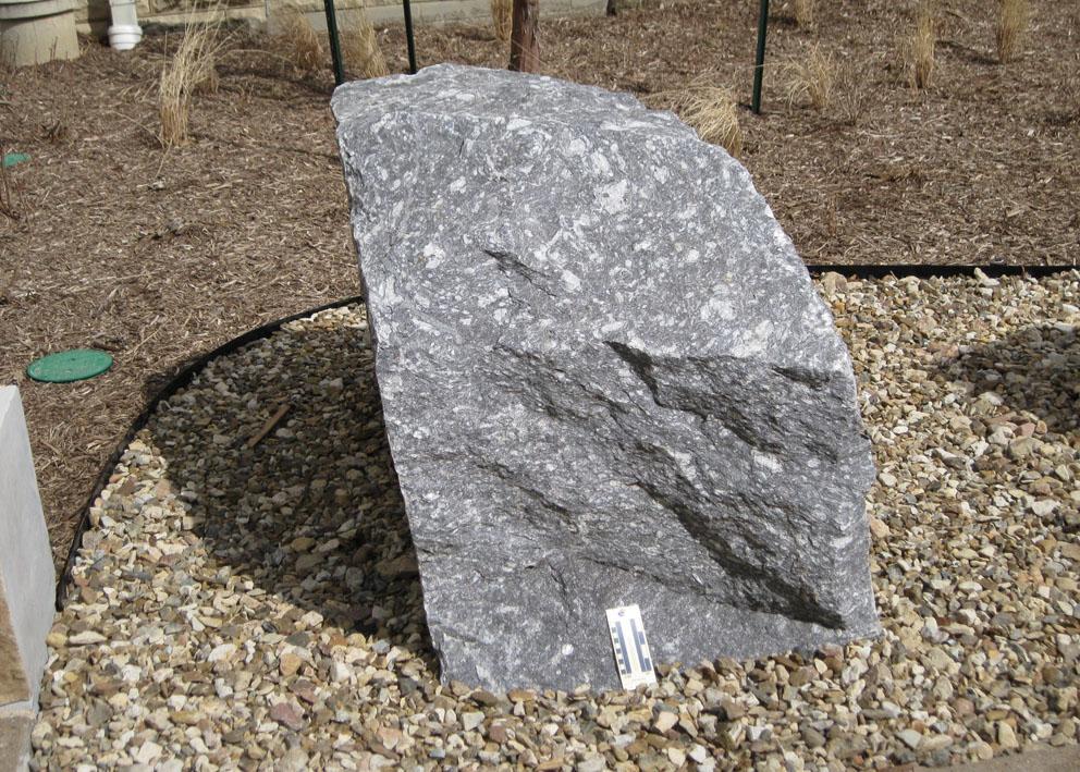 boulder 6 is Augen Gneiss and is located on the northeast side of the courtyard.