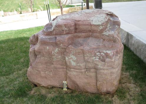 boulder 22 is quartzite and is located on the south side of the courtyard just north of Slawson Hall.  