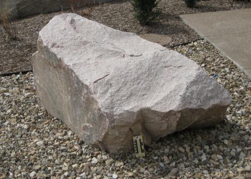 boulder 3 is granite and is located on the southwest corner of Lindley Hall in the courtyard.