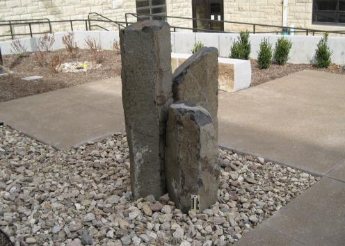boulder 7 is three pieces of Columnar Basalt.  This is located on the north side of the courtyard.
