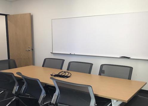 slawson 194. Seats 8 people. Users can plug in laptops for projection to a TV screen