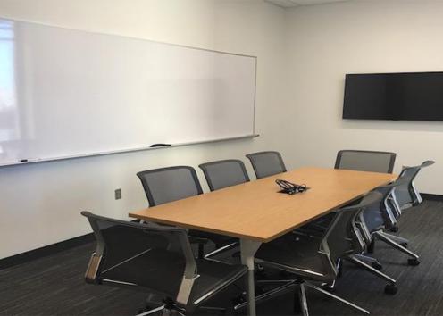 slawson 194. Seats 8 people. Users can plug in laptops for projection to a TV screen
